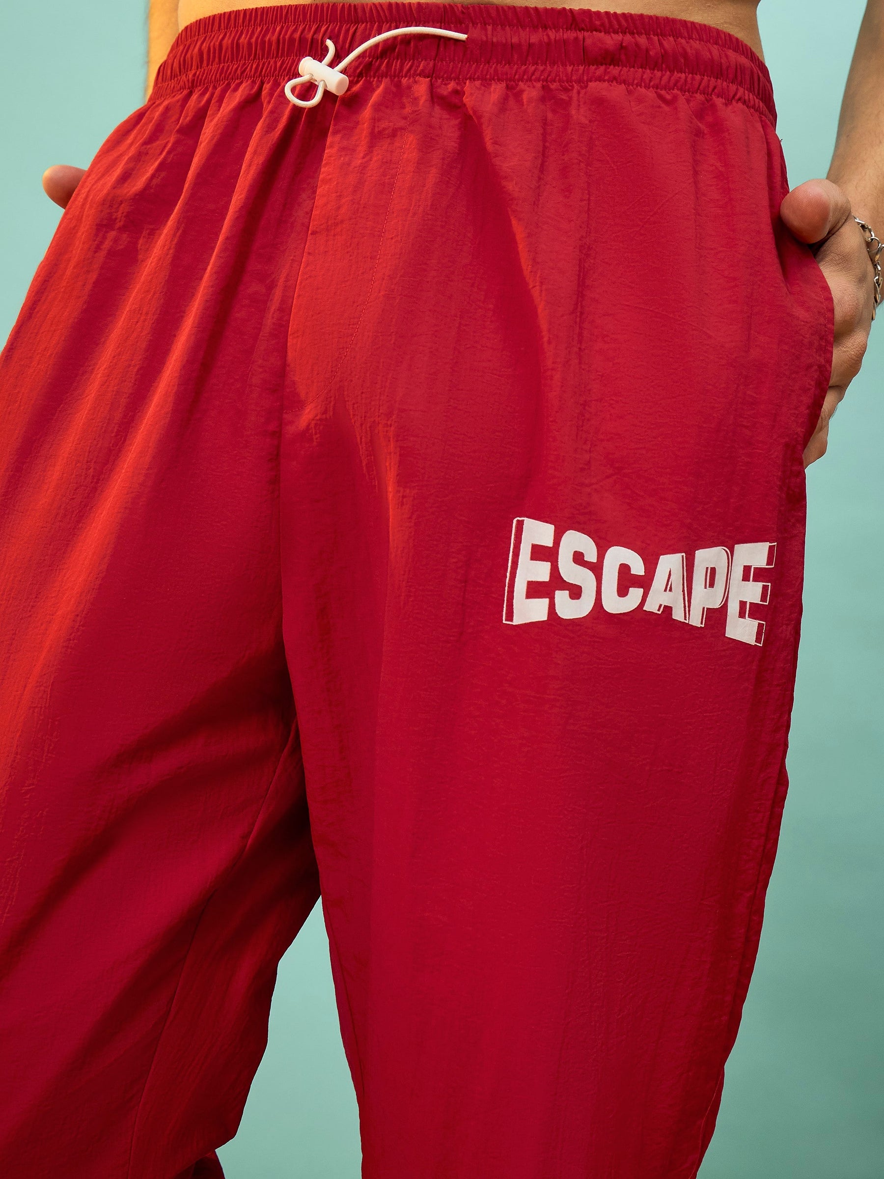 Red ESCAPE Print Parachute Pants-MASCLN SASSAFRAS