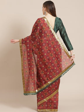 Women Maroon Patola Saree With Green Unstitched Blouse