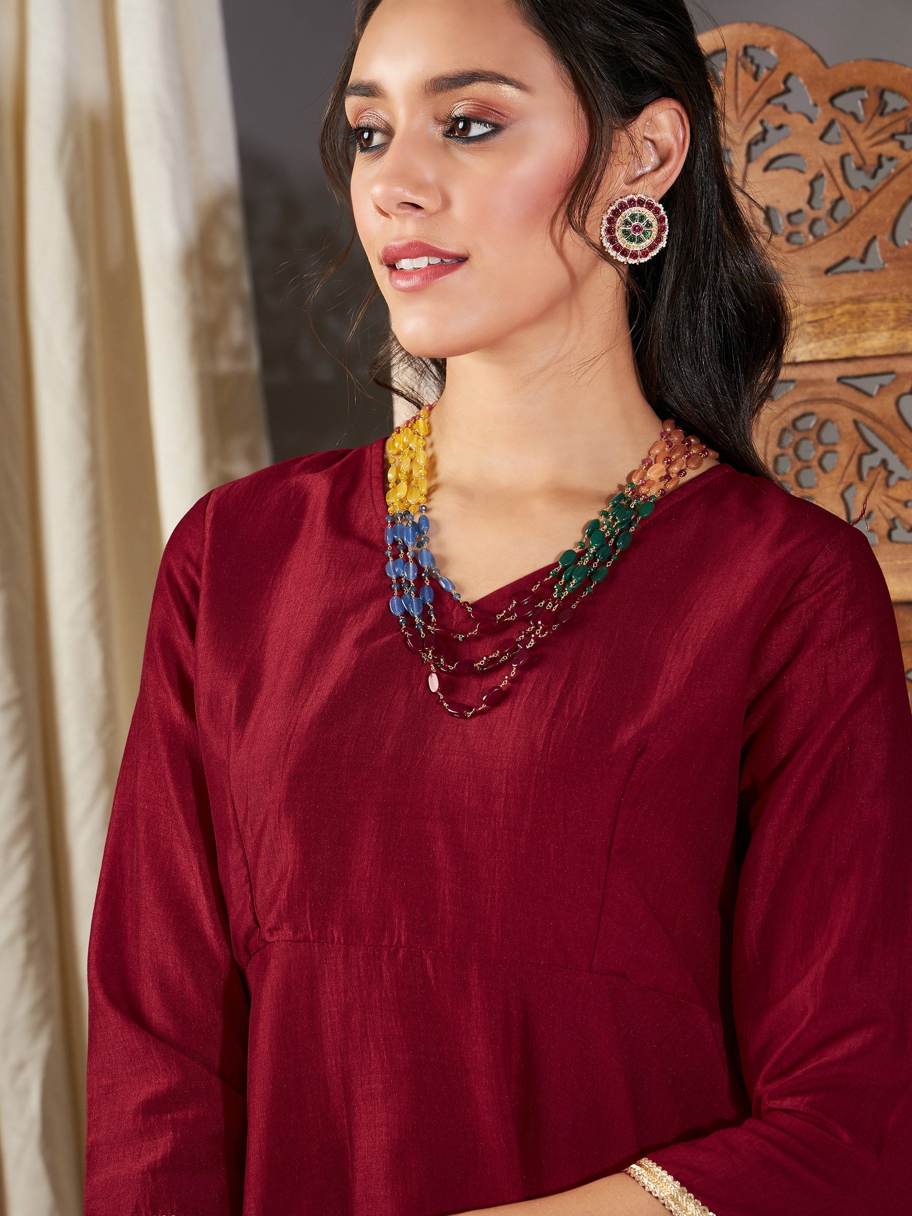 Maroon Zari Embroidered Peplum Top-Shae by SASSAFRAS